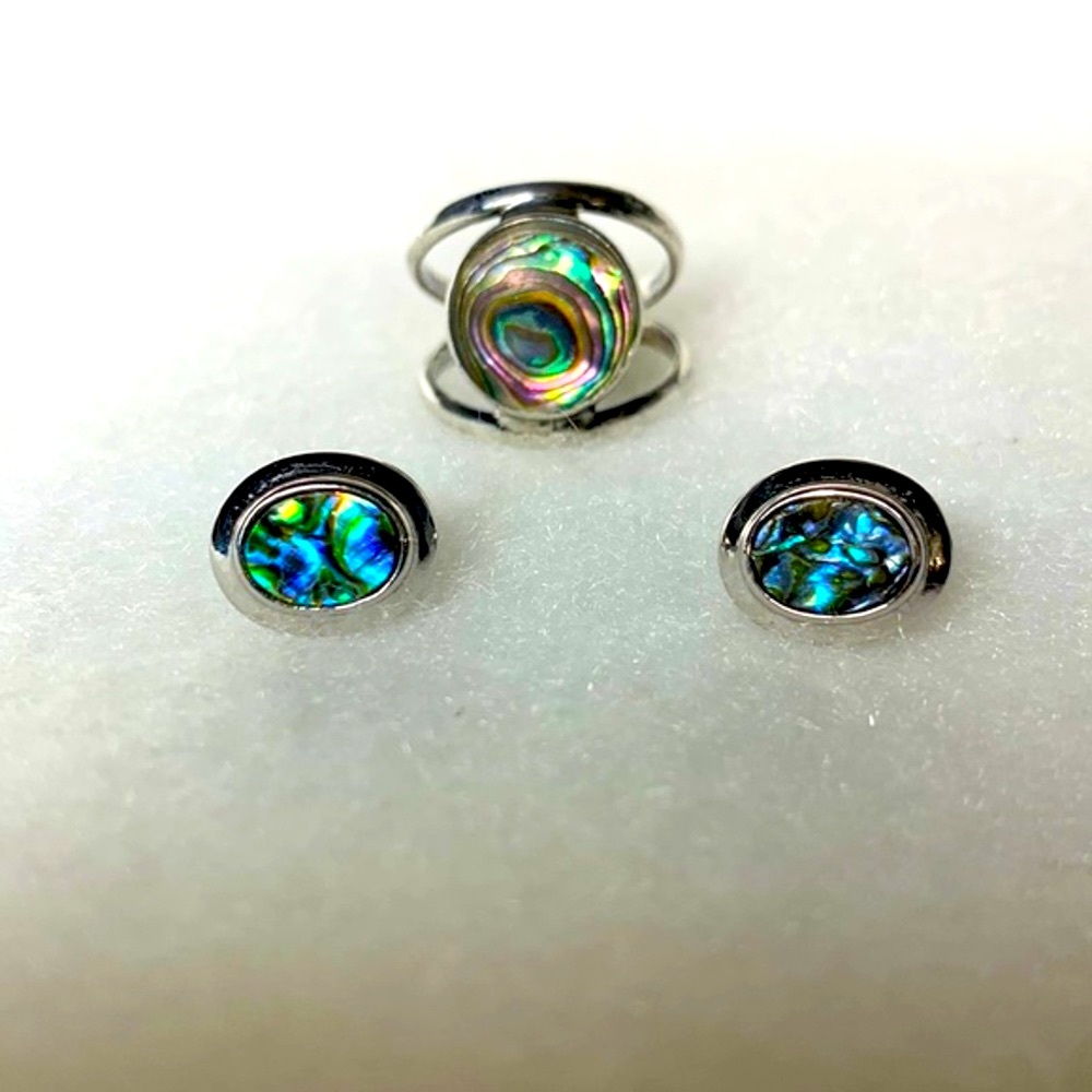 Set of mother of pearl ring and oval post earrings in silver settings